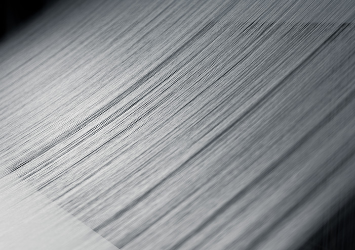 A processed yarn 1/3 the diameter of a single hair creates the world's lightest fabric.